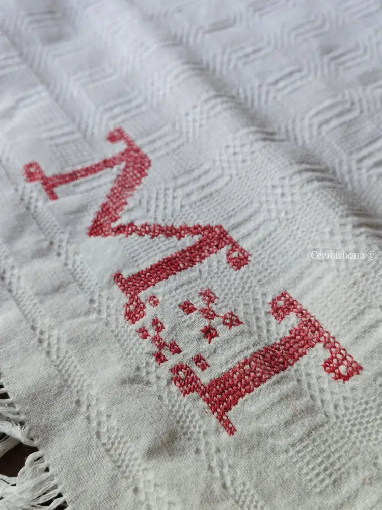 Asciugamano con monogramma rosa MT Asciugamano con monogramma MT