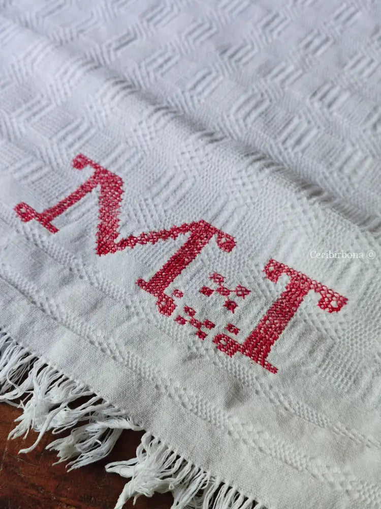 Asciugamano con monogramma rosa MT Asciugamano con monogramma MT