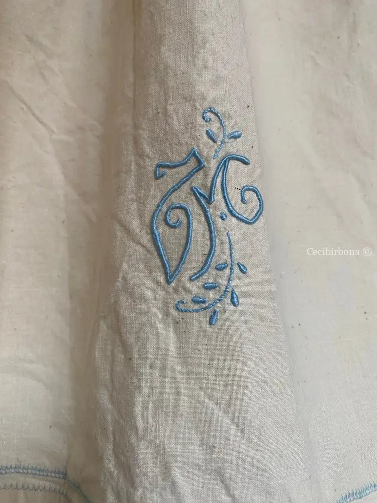 Grembiule in ghinea con monogramma celeste TM (Ref. 18) grembiule donna antico