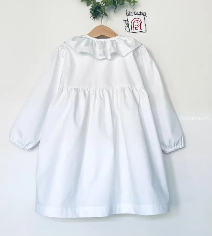 Il grembiulino Flora - Grembiule bianco per asilo con tasche a fiorellini grembiule asilo bimba