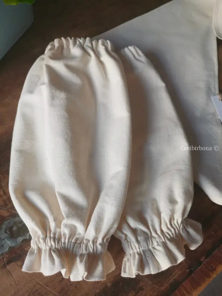 Manichette e foulard in tessuto di ghinea accessori cucina