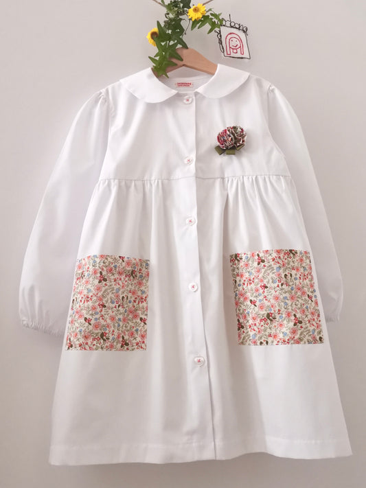 The Flora white apron - white cotton apron for primary school with a round collar