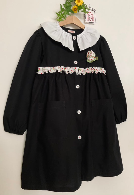 The black apron with cherries and pierrot collar for primary school